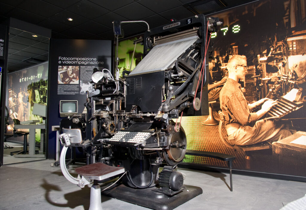 The display highlights the legacy of Italy's print media industry, raising questions about the future of its historic newspaper Gedi in the face of government ownership and foreign investment concerns.