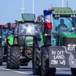 Dutch farmers protest with a convoy of tractors, displaying signs that signal resistance to imports, raising concerns over food supply chains for the UK.