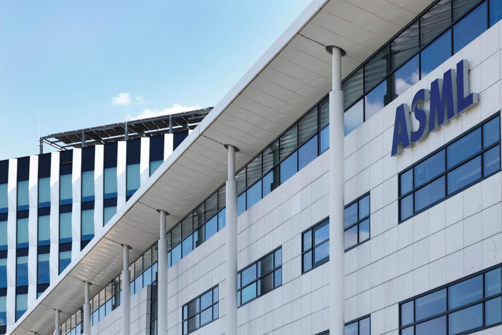 The ASML headquarters in Eindhoven, a symbol of Dutch tech wealth investing in sustainable urban mobility through green infrastructure.