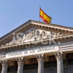 The Spanish Congress of Deputies, the heart of national legislative power, is central to the political maneuvers described in the article.