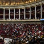 French lawmakers convene in the grand chamber of the Parliament as key debates over the 2026 budget unfold, reflecting the high stakes of fiscal policy in Europe.