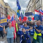 Pro-EU demonstrators rally in a European city, calling for the UK to rejoin the EU, amid political debates over Brexit and its impact on trade and policy.