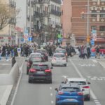 Madrid's central district bustles with traffic as new low-emission zone regulations take effect, granting a one-year grace period for unlicensed polluting vehicles.
