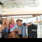 A family of tourists prepares for a holiday, symbolizing the travelers who may be affected by Trump’s proposed 'Gold Card' visa policy.