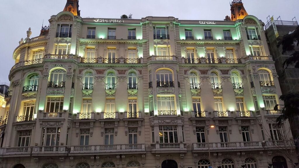 The Spanish bank Plus Ultra, at the center of a major EU money-laundering probe, is pictured in its opulent, illuminated headquarters.
