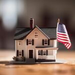 The U.S. housing market, represented by this miniature home with the American flag, is a key indicator of global economic trends affecting mortgage rates worldwide.