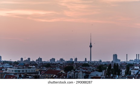 Berlin's skyline at dusk, a symbol of the city grappling with soaring rents and housing affordability in Germany's most expensive metro area.