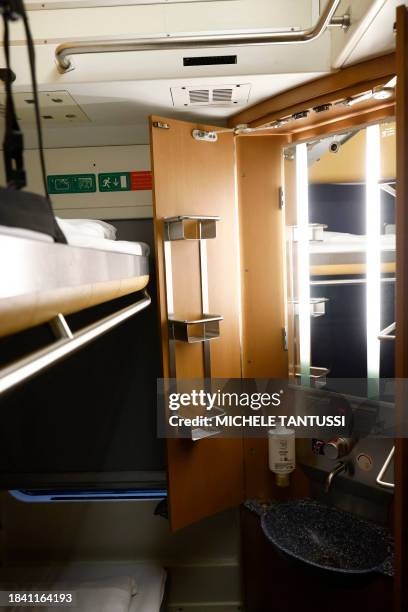 Inside a new night train connecting Paris and Berlin, showcasing the modern amenities designed for comfortable overnight travel.